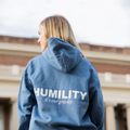 humility_is_our_gravity_back_view_of_blue_hoodie