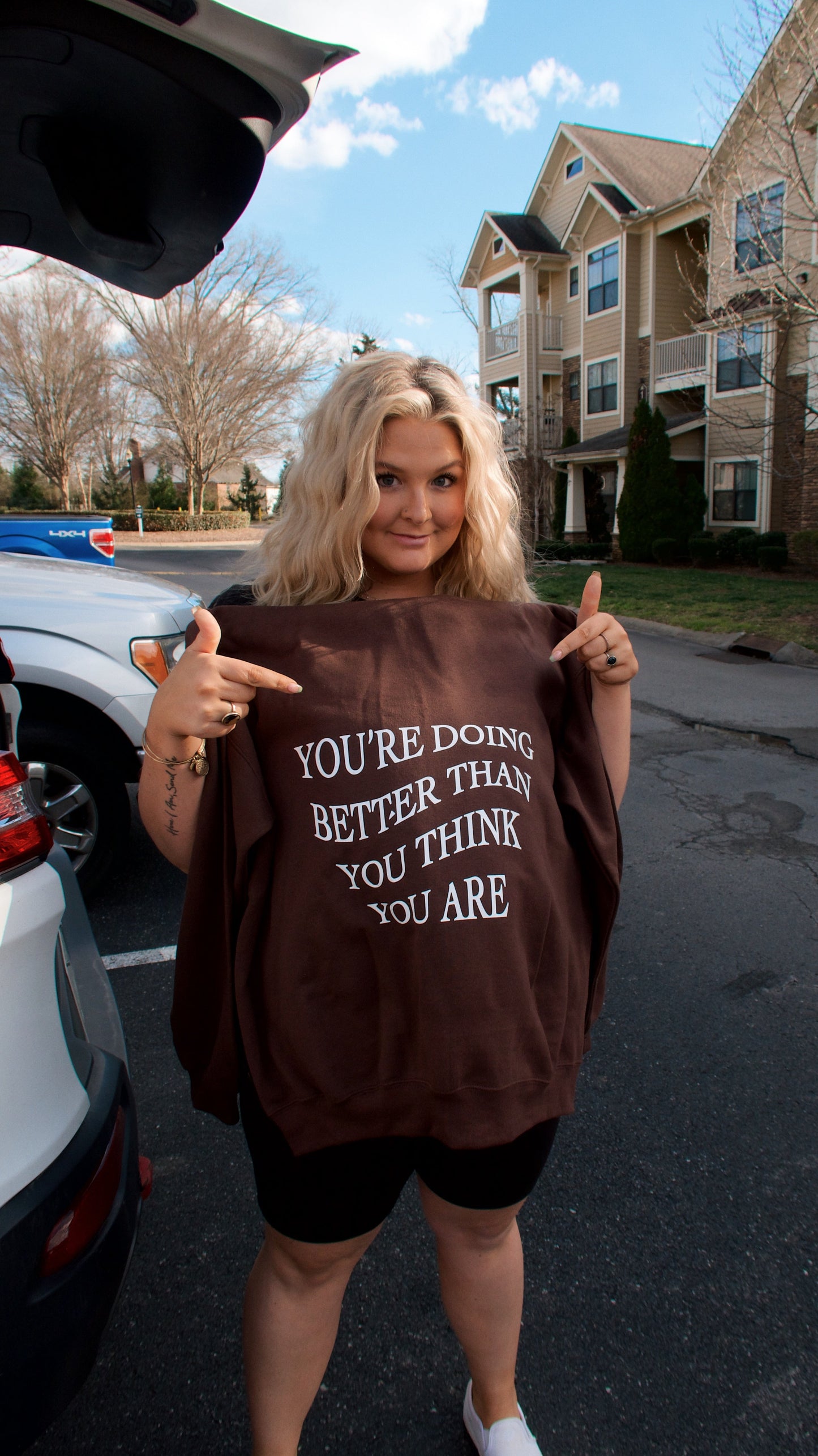 gildan brown 50% cotton and 50% polyester hoodie with inspirational christian quote on the back. You're doing better than you think you are quote like trendy Pinterest and VSCO hoodies and sweatshirts