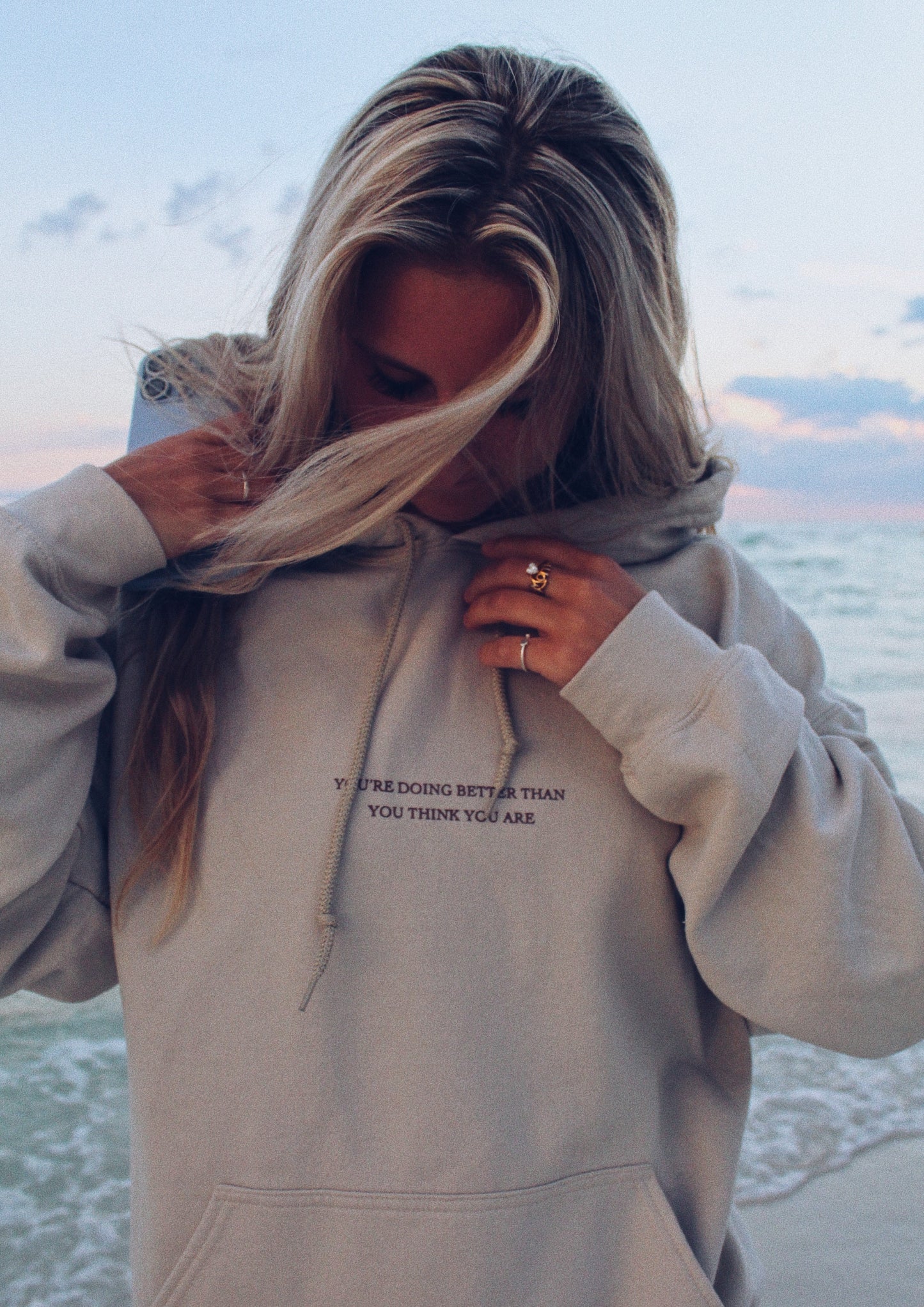 gildan tan 50% cotton and 50% polyester hoodie with inspirational christian quote on the back. You're doing better than you think you are quote like trendy Pinterest and VSCO hoodies and sweatshirts